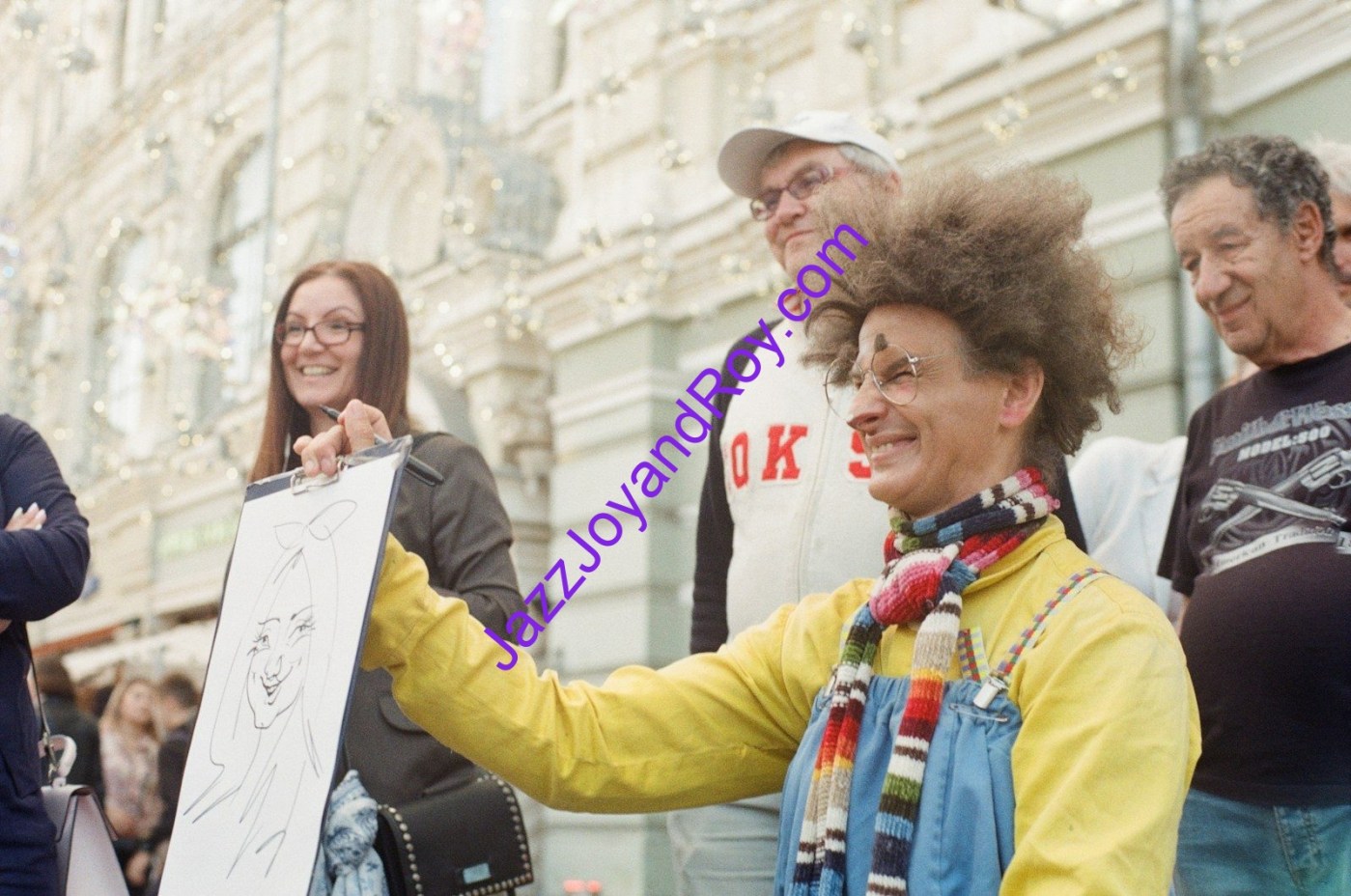woman in yellow jacket holding white printer paper
